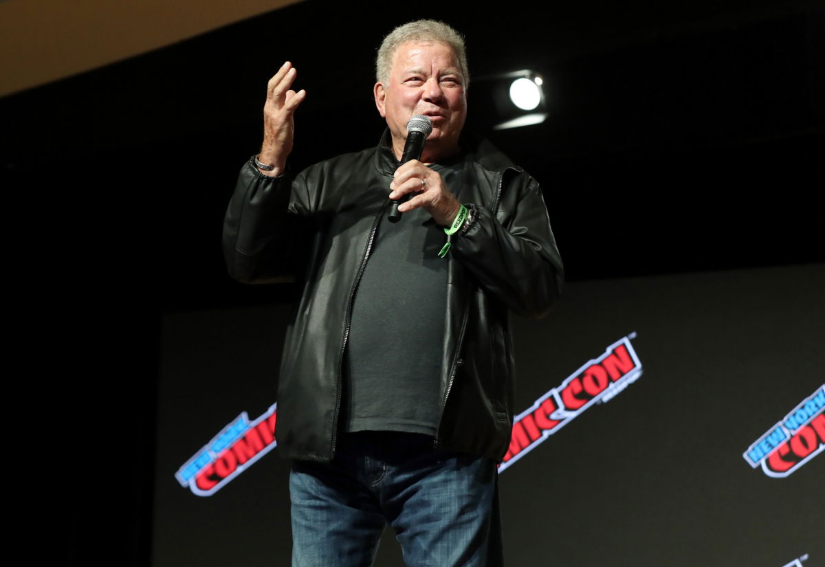 <i>Bennett Raglin/Getty Images North America/Getty Images for ReedPop</i><br/>William Shatner speaks at the William Shatner Spotlight panel during Day 1 of New York Comic Con 2021 at Jacob Javits Center on October 7 in New York City.
