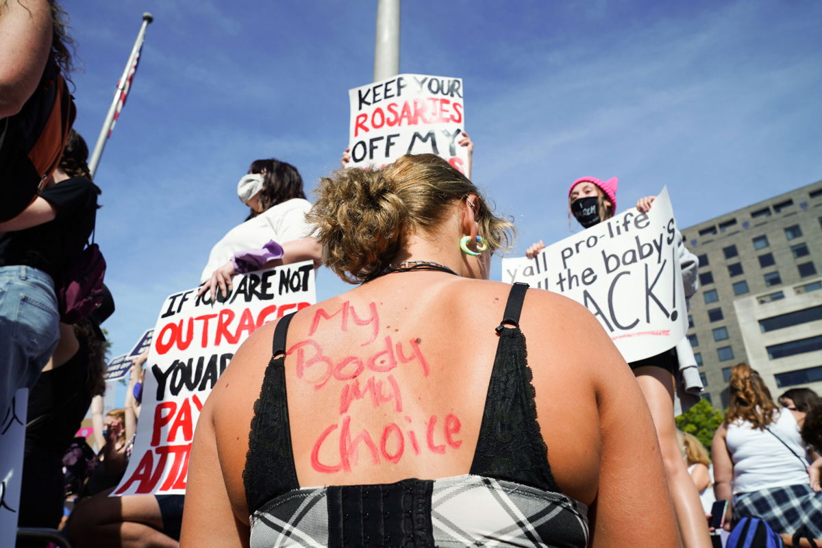 <i>Leigh Vogel/Getty Images</i><br/>Protesters attend the Rally For Abortion Justice on October 02