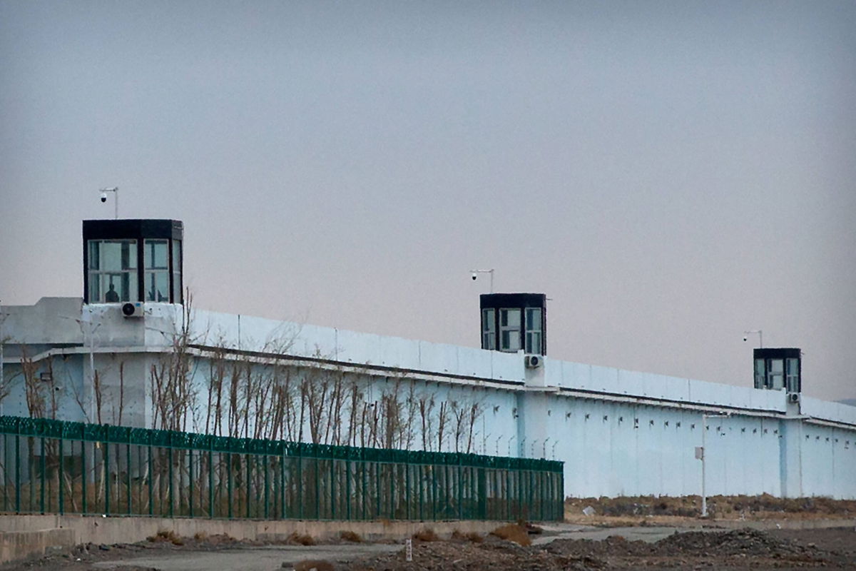 <i>Mark Schiefelbein/AP</i><br/>A guard patrols Number 3 Detention Center in Dabancheng in western China's Xinjiang Uyghur Autonomous Region.