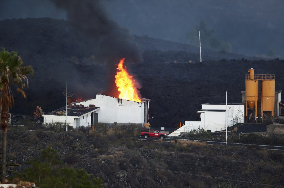 <i>Sergio Perez/Reuters</i><br/>A cement factory in Los Llanos was set ablaze by the lava.