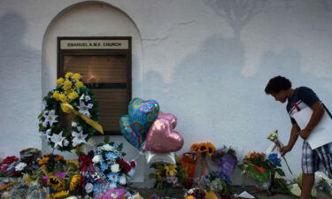 Families of the Charleston church massacre victims have reached a settlement with the Justice Department. Landon Whitchlock