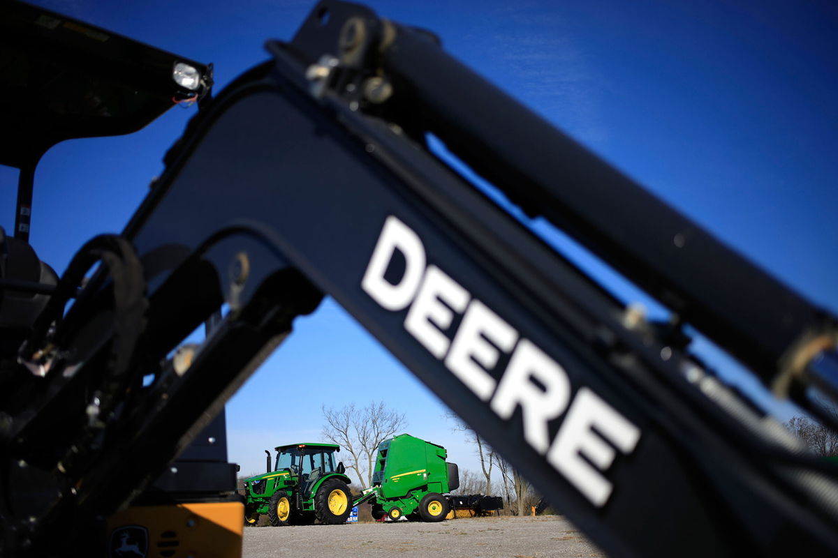 <i>Luke Sharrett/Bloomberg/Getty Images</i><br/>A John Deere worker who was walking to the picket line on October 27 in Milan