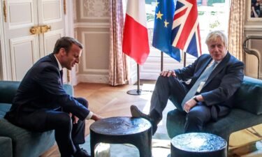 France has detained a British fishing vessel and announced it will close nearly all of its ports to trawlers from the UK. French President Emmanuel Macron and Britain's Prime Minister Boris Johnson are seen here in 2019.