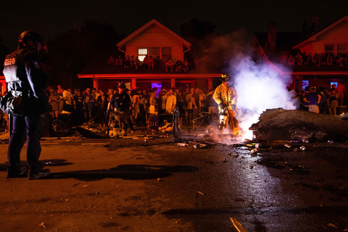 <i>Jordan Prather/USA TODAY Sports</i><br/>A burning piece of furniture on University Avenue is extinguished by the Lexington Fire Department after a victory by the Kentucky Wildcats over the Florida Gators.