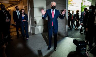 President Joe Biden and Speaker of the House Nancy Pelosi walk out after a meeting with House Democrats on Capitol Hill on Friday.