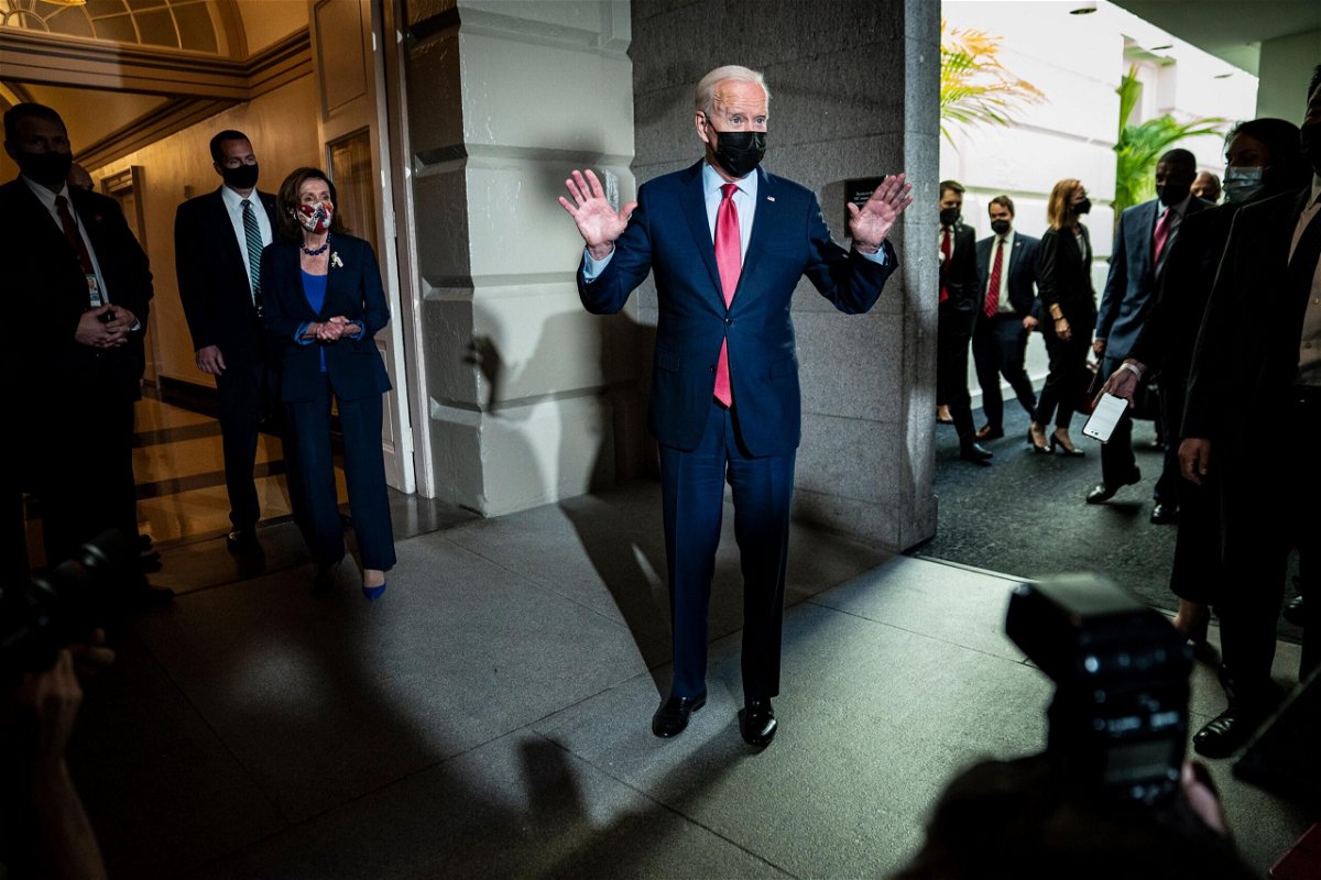 <i>Jabin Botsford/The Washington Post/Getty Images</i><br/>President Joe Biden and Speaker of the House Nancy Pelosi walk out after a meeting with House Democrats on Capitol Hill on Friday.