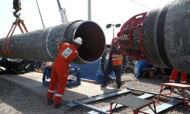 Russian Deputy Prime Minister Alexander Novak said Wednesday that "early completion of the certification" for Nord Stream 2 would help "cool off the current situation." Workers are seen here at the construction site of the Nord Stream 2 gas pipeline