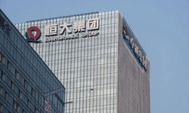 The China Evergrande Group logo displayed atop the company's headquarters in Shenzhen