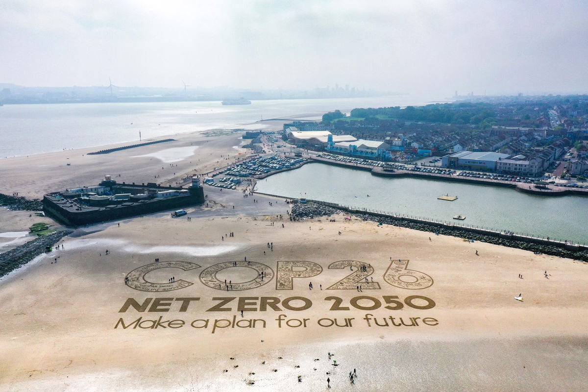 <i>Christopher Furlong/Getty Images</i><br/>Giant sand art adorned England's New Brighton Beach in May to highlight the forthcoming COP26 global climate conference in Glasgow.