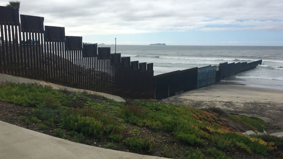 <i>Jason Morris/CNN</i><br/>A woman was pronounced dead early Saturday morning after trying to swim across the US-Mexican border with a group of migrants. The western-most part of the US-Mexican border shown here overlooks the Pacific Ocean