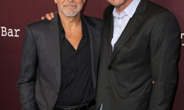 George Clooney (L) and Ben Affleck (R) at the premiere of their film "The Tender Bar."