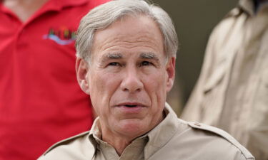 Texas Gov. Greg Abbott speaks during a news conference along the Rio Grande