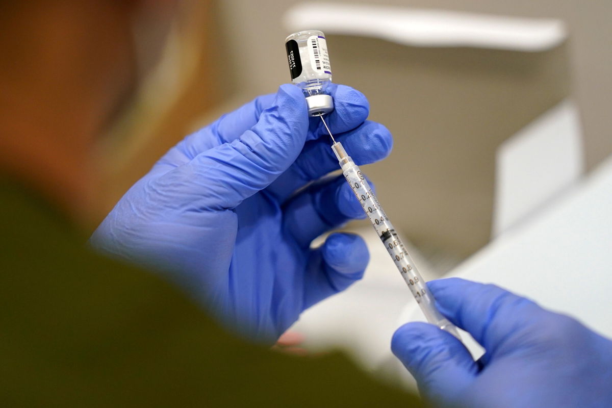 <i>Lynne Sladky/AP</i><br/>A survey by the Kaiser Family Foundation reports 72% of unvaccinated workers vow to quit if ordered to get the Covid-19 vaccination.