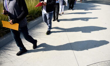Friday's jobs report will shed some light on whether August's disappointing numbers were just a blip — or the start of an unwelcome trend. People are shown here lining up to attend a job fair for employment with SoFi Stadium and Los Angeles International Airport employers