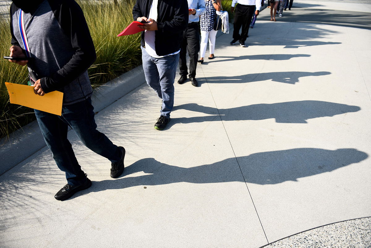 <i>Patrick T. Fallon/AFP/Getty Images</i><br/>Friday's jobs report will shed some light on whether August's disappointing numbers were just a blip — or the start of an unwelcome trend. People are shown here lining up to attend a job fair for employment with SoFi Stadium and Los Angeles International Airport employers