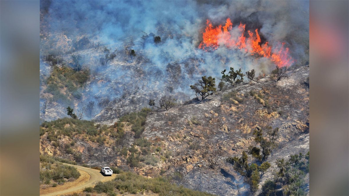 <i>Santa Barbara County Fire Department</i><br/>Part of the Alisal Fire burns in California's Las Flores Canyon on October 15.