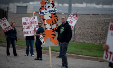 First shift worker Travis Huffman joins other BCTGM Local 3G union members in a strike against Kellogg Co. at the Kellogg's plant on Porter Street in Battle Creek