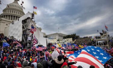 Trump supporters clash with police and security forces as people try to storm the US Capitol on January 6 in Washington