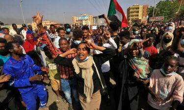 Sudanese protesters march in 60th Street in the capital Khartoum