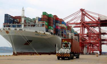An ocean carrier loads containers for outbound shipment at a container terminal in Lianyungang