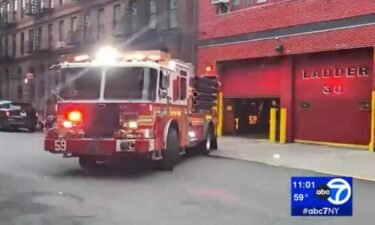 A fire truck leaves a station in New York City. More than 2