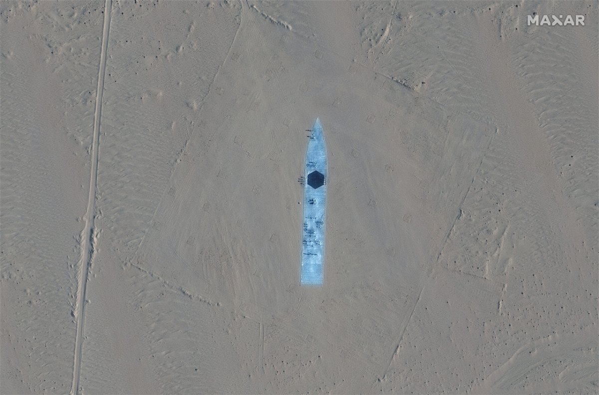 <i>Satellite image ©2021 Maxar Technologies</i><br/>A satellite picture shows a mobile target in Ruoqiang