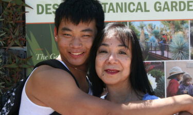 Christian Hall beside his mother Fe.