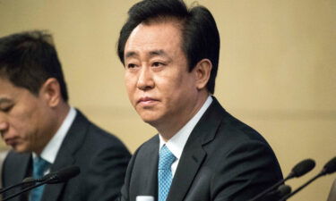 Evergrande chairman Xu Jiayin has sold more than 7 billion yuan ($1.1 billion) worth of personal assets to prop up his embattled company. Xu Jiayin is shown here on March 9