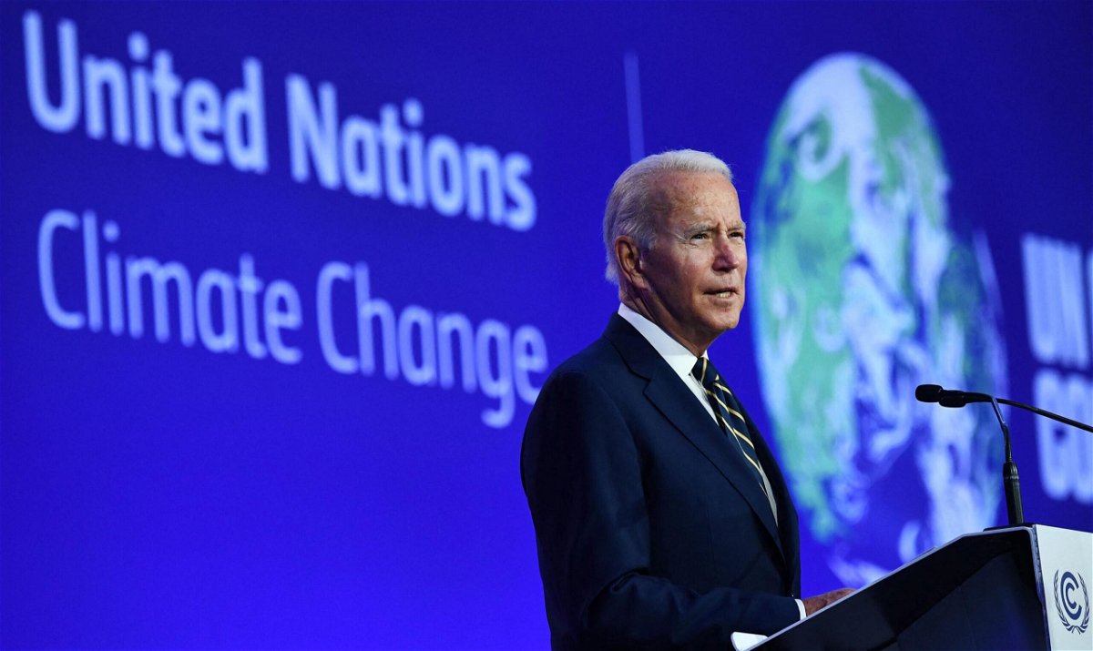 <i>Brendan Smialowski/AFP/Getty Images</i><br/>US President Joe Biden delivers a speech on stage during a meeting at the COP26 UN Climate Change Conference in Glasgow