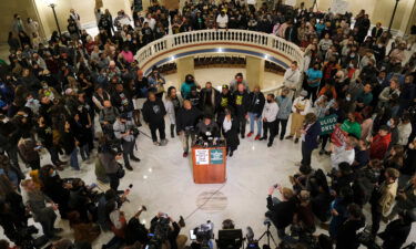 Madeline Davis-Jones and other family members and friends talk to reporters Wednesday at the Capitol in Oklahoma City.