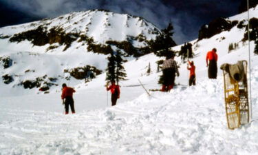 This photo released by Rocky Mountain National Park shows teams searching for Rudi Moder on February 20