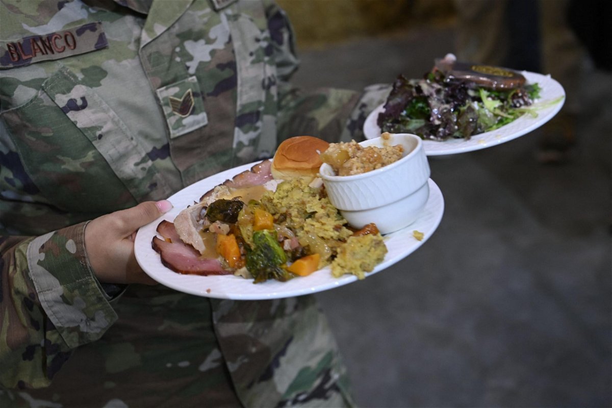 <i>Brendan Smialowski/AFP/Getty Images</i><br/>US troops around the globe will get Thanksgiving meal despite supply chain obstacles. Soldiers