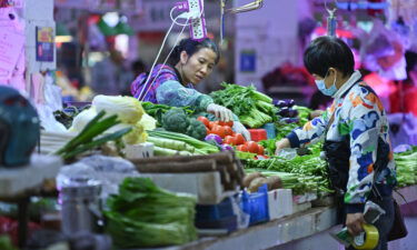 China is telling families to stock up on food and other daily essentials as bad weather