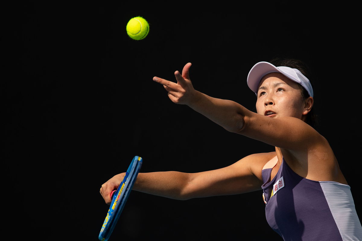 Peng Shuai of China serves to Hibino Nao of Japan during their women's singles first round match at the Australian Open tennis championship in Melbourne