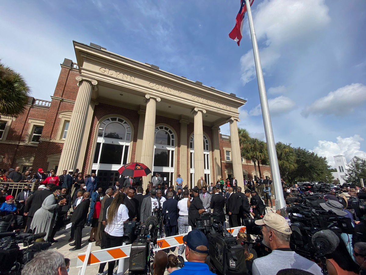 <i>Stephen B. Morton/AP</i><br/>Hundreds of pastors rally during the trial of Greg McMichael and his son