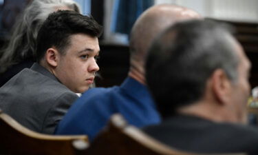 Kyle Rittenhouse listens as attorneys discuss the potential for a mistrial during Rittenhouse's trial at the Kenosha County Courthouse on November 17