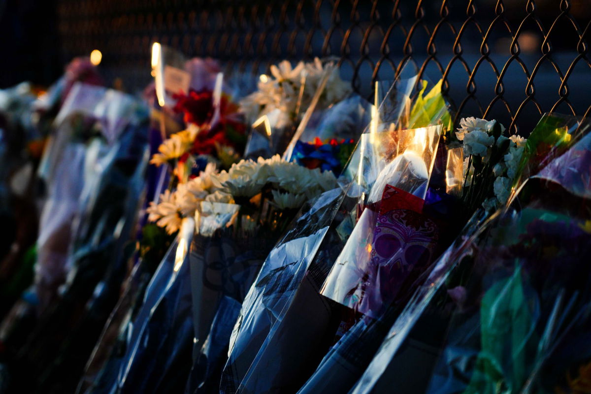 <i>Alex Bierens de Haan/Getty Images</i><br/>Flowers are seen outside of the canceled Astroworld festival at NRG Park on November 7