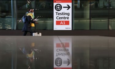 A covid testing center sign at Heathrow Terminal 2 on November 28 in London
