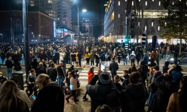 Injuries have been reported after police in the Dutch city of Rotterdam fired warning shots during a protest over Covid-19 measures on December 19