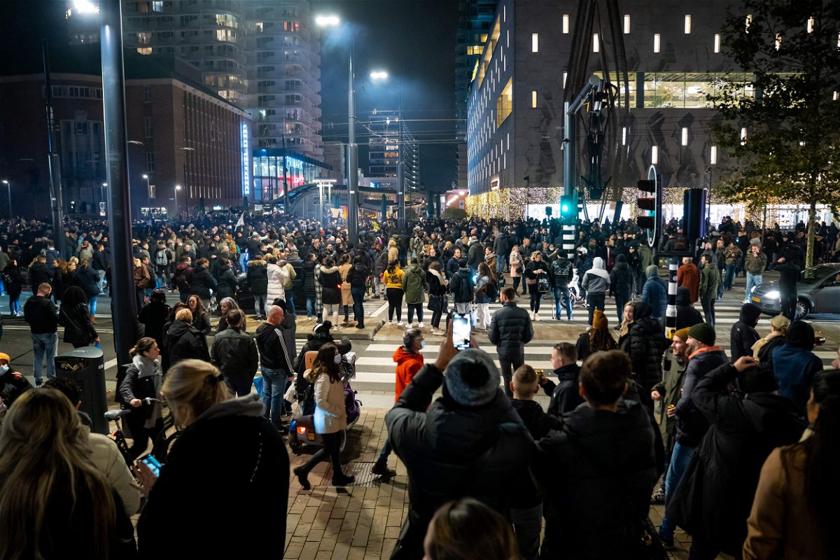 <i>Killian Lindenburg/ANP/AFP/Getty Images</i><br/>Injuries have been reported after police in the Dutch city of Rotterdam fired warning shots during a protest over Covid-19 measures on December 19