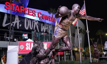 The statue of former Los Angeles Lakers Magic Johnson is seen in front of Staples Center following an NBA basketball game between the Los Angeles Clippers and the San Antonio Spurs Tuesday