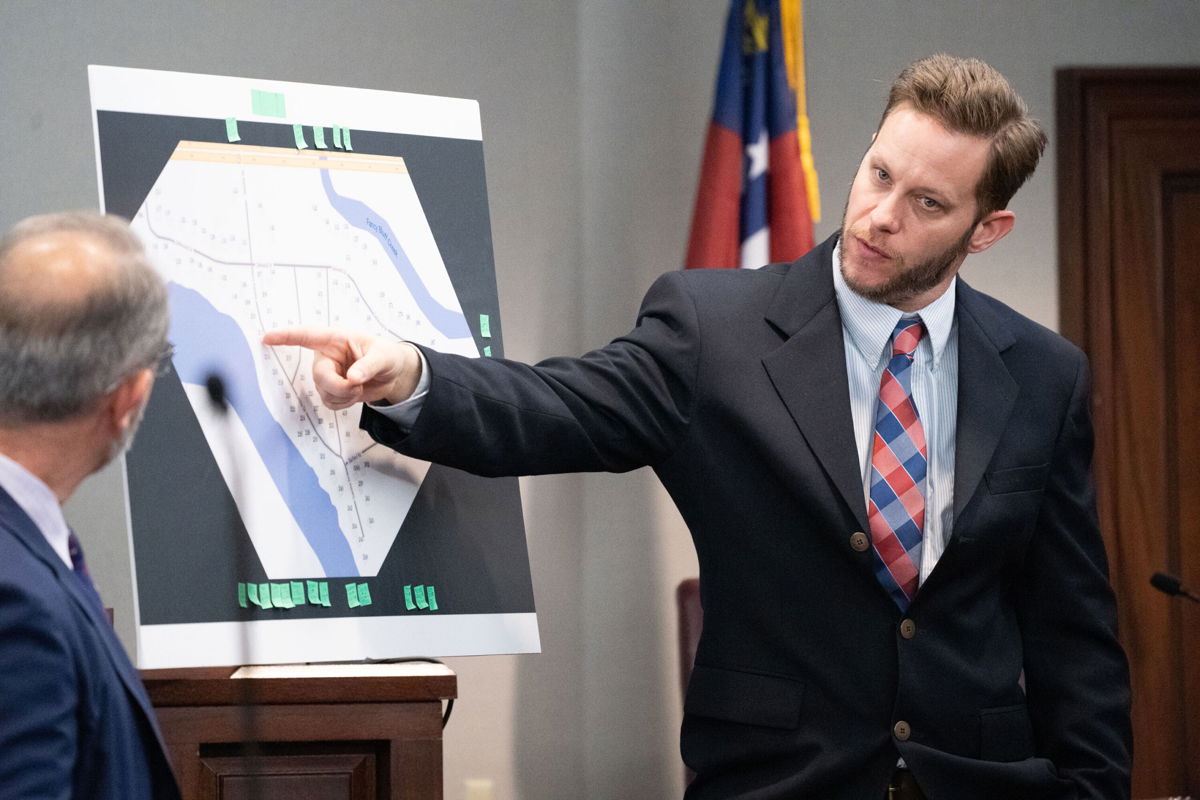 <i>Sean Rayford/Getty Images</i><br/>Former Glynn County police officer Ricky Minshew testifies during the trial for Ahmaud Arbery's shooting death at the Glynn County Courthouse on November 8