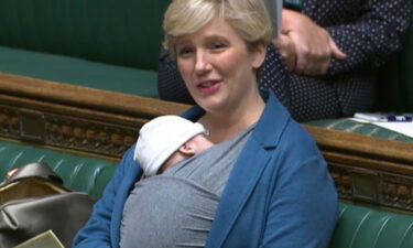 Labour MP Stella Creasy with her newborn baby in the chamber of Britain's House of Commons in September.