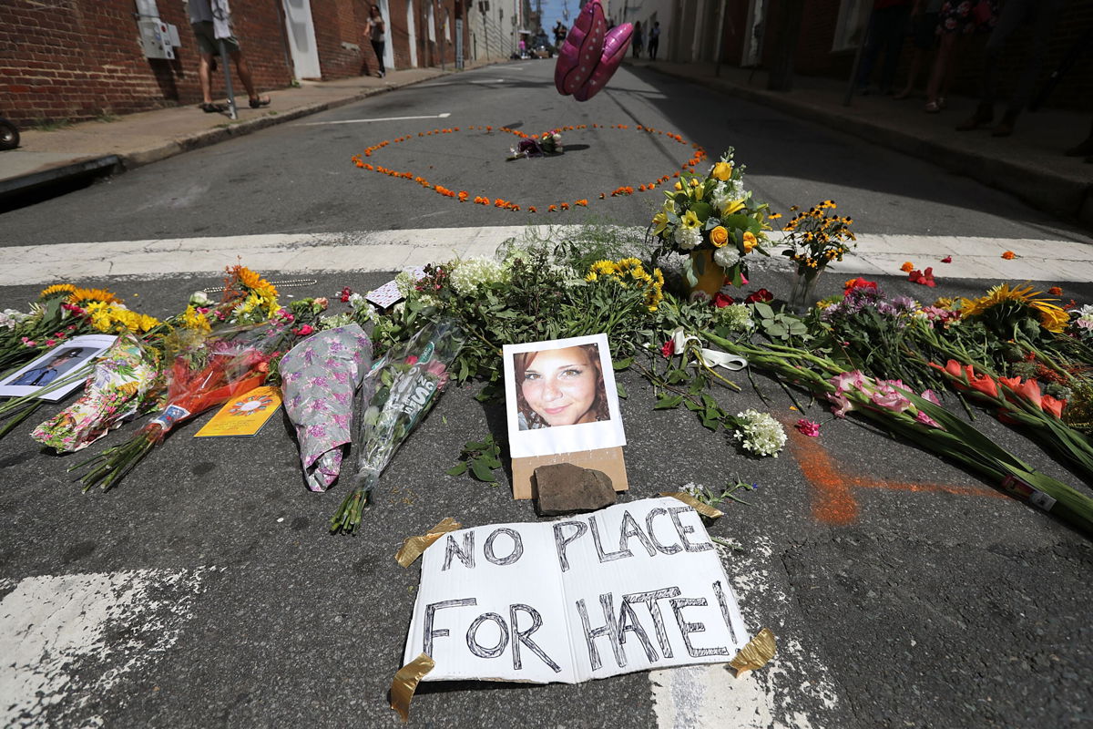 <i>Chip Somodevilla/Getty Images</i><br/>Flowers at a memorial for Heather Heyer