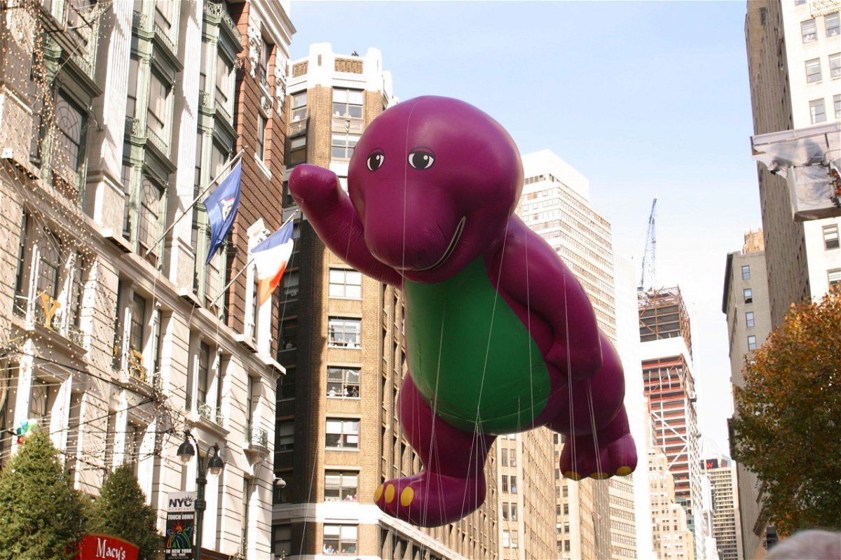 <i>NBC/Getty Images</i><br/>Barney the Dinosaur balloon at the 2002 Macy's Thanksgiving Day Parade on November 28