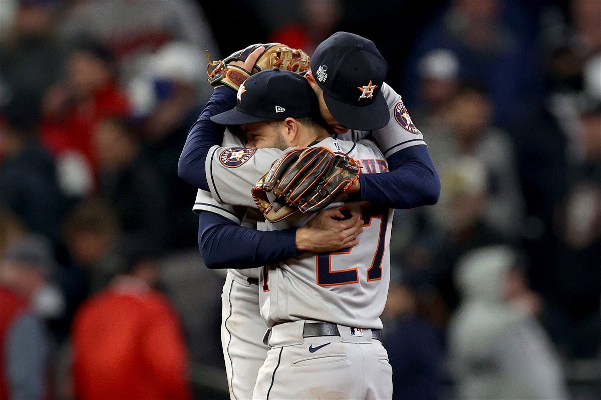 <i>Elsa/Getty Images</i><br/>Carlos Correa and Jose Altuve of the Houston Astros celebrate the team's 9-5 win against the Atlanta Braves in Game 5.