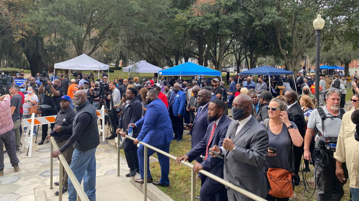 <i>Angela Barajas/CNN</i><br/>Dozens of Black pastors gather outside the Glynn County Courthouse during the Ahmaud Arbery death trial.