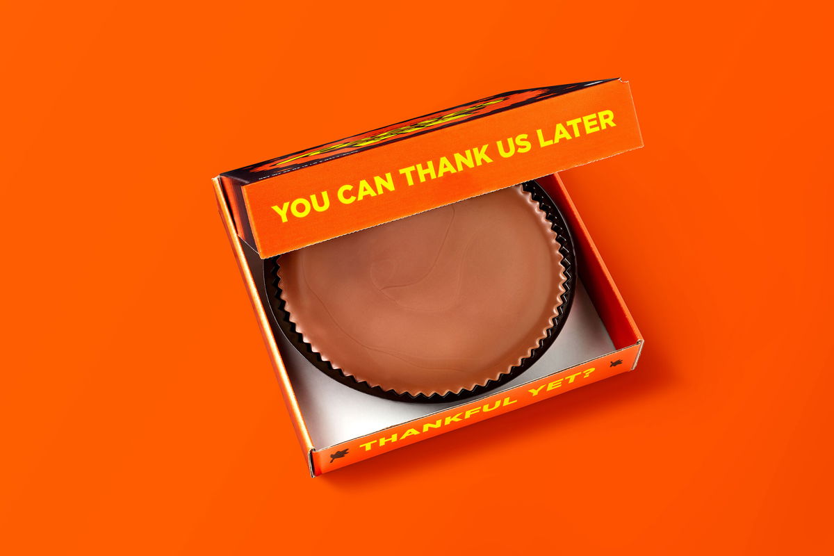 <i>The Hershey Company</i><br/>Reese's is releasing its largest peanut butter cup ever: a nine-inch Reese's Thanksgiving Pie.