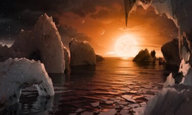 This is an artist's concept of the surface of the exoplanet TRAPPIST-1f in the Trappist-1 system