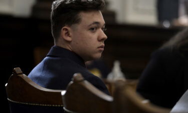 Kyle Rittenhouse listens as his lawyer gives opening statements to the jury at the Kenosha County Courthouse in Kenosha